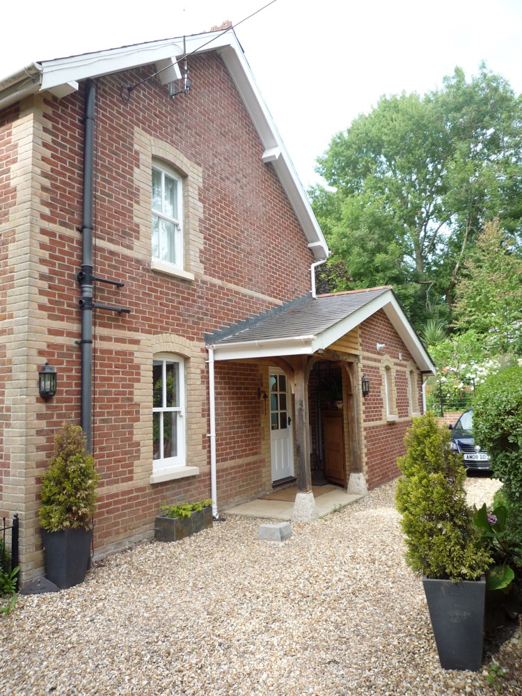 Single storey wraparound extension incorporating vaulted ceilings with roof windows.