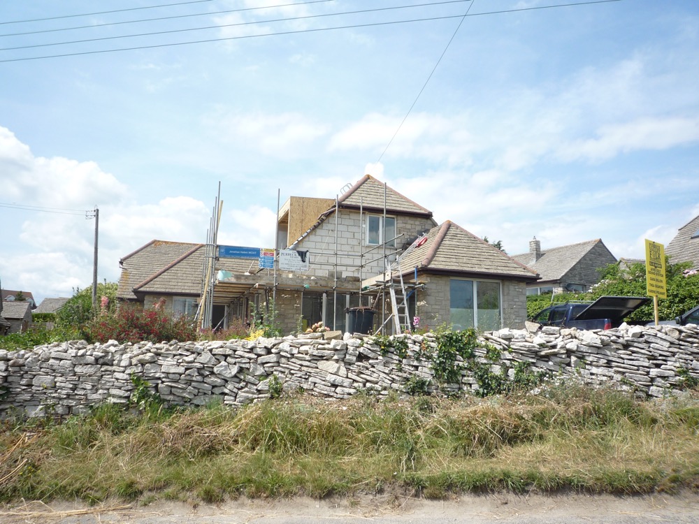 Currently on site [July 2019].
Front dormer/patio door enlargements to improve views down to Winspit + garage conversion
